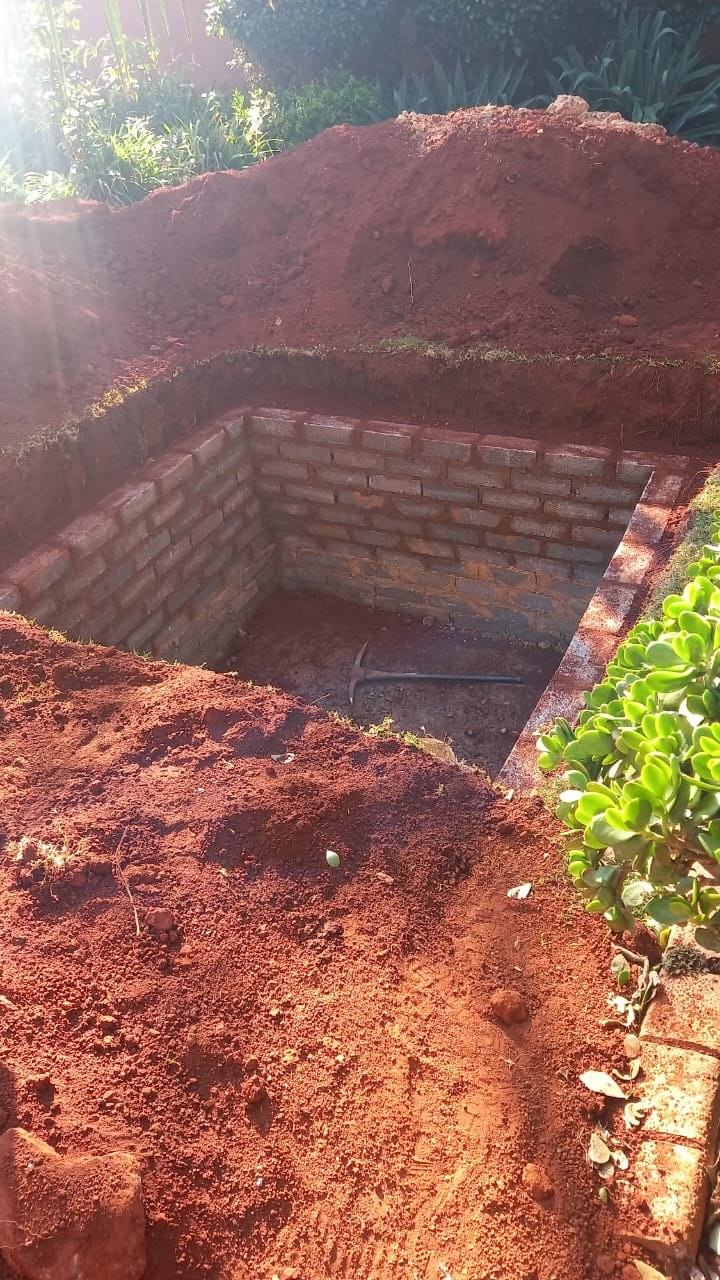Septic tank plumbing image showing a newly built brick septic tank excavation during installation work by Plumb A Nator.